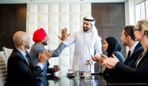 Team of business professionals working together in a modern office